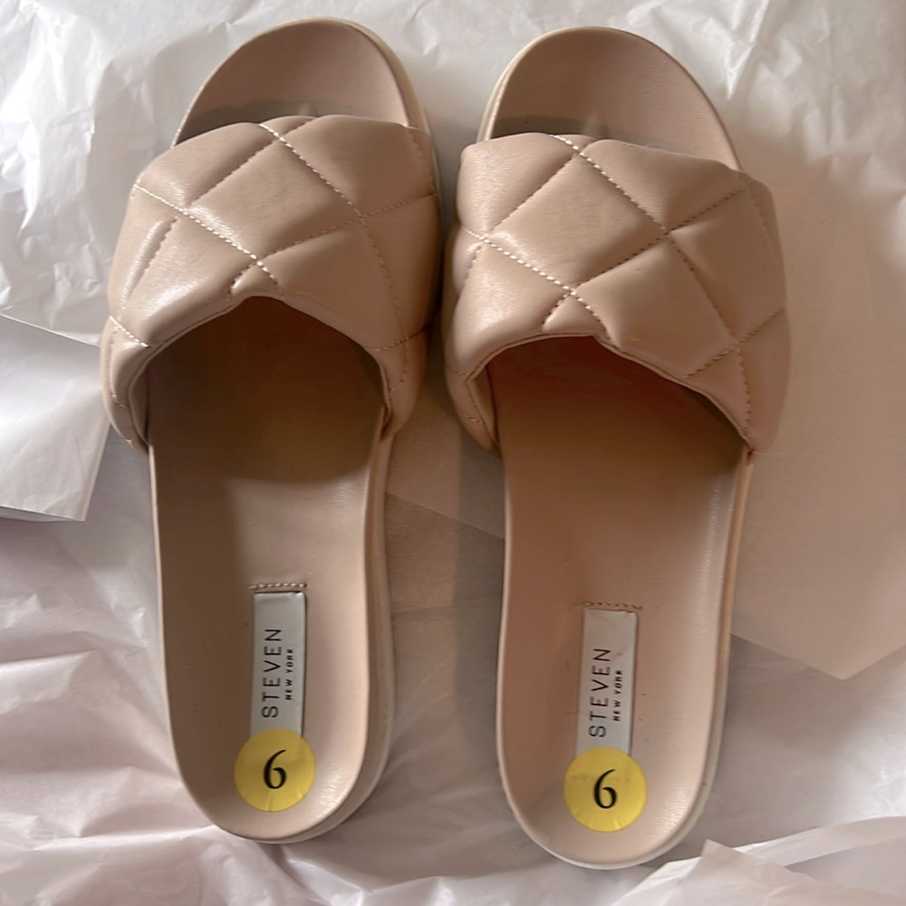 Flat quilted slip on sandal